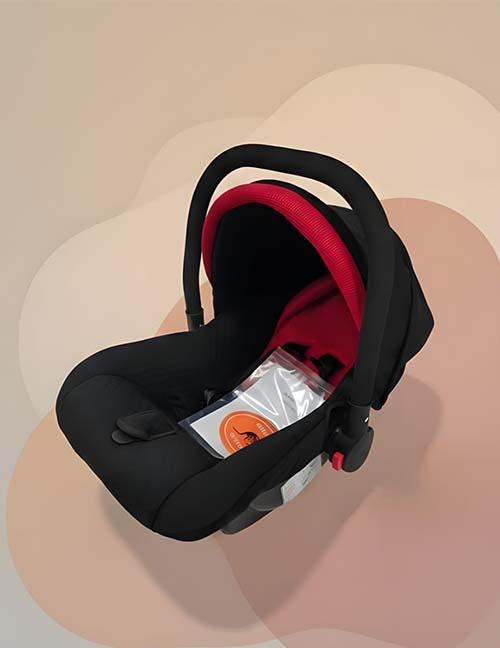 كارسيت يمفرش جراكو للأطفال (Gracco By Gomaa) - كرسي سيارة آمن ومريح لحديثي الولادة مع مظلة واقية
