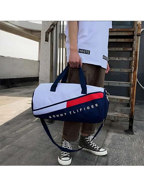 شنطة هاندباج ماركة tommy الشهيرة خامة وتر بروف بتشيل من7 ل14 كيلو مبطنه قماش 2سوستة